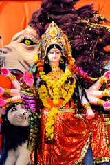 Sculpture of Hindu Goddess Durga, Goddess Durga idol with ornaments in close up side face view