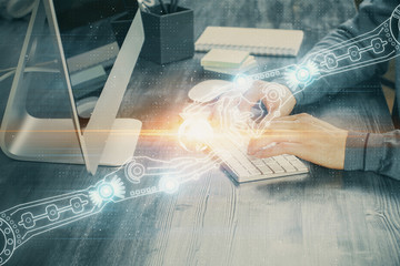 Double exposure of tech drawings with hands working on computer background. Concept of innovation.