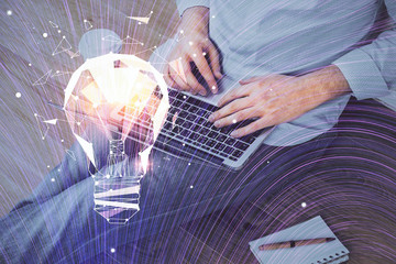 Growing arrows with businessman working on computer on background. Success concept. Double exposure.