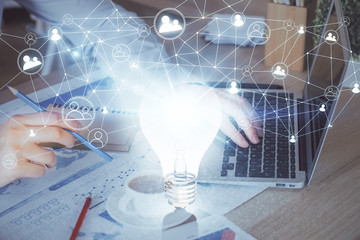 Growing arrows with businessman working on computer on background. Success concept. Double exposure.