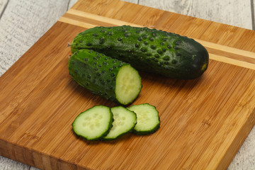Ripe fresh green two cucumbers