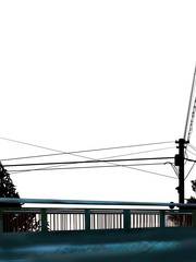 silhouette of electric pole and old bridge