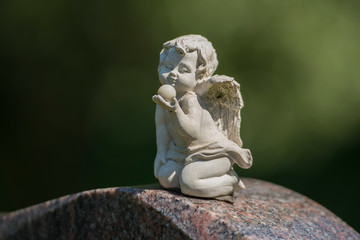 Fototapeta na wymiar Friedhof, Grabstein, Statue 