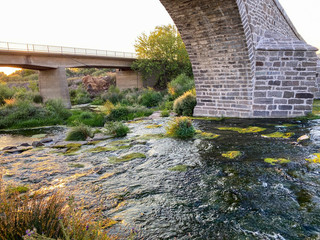 amazing river stream rocks flowing. Spectacular river view in the evening sun. river wild rock view. River wild rocks. 