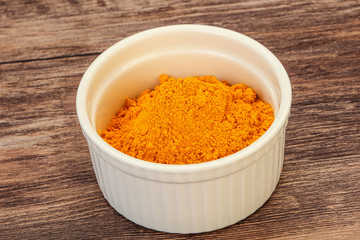 Tumeric powder in the bowl