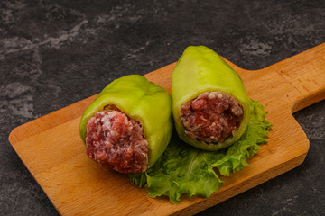 Raw stuffed bell pepper with meat