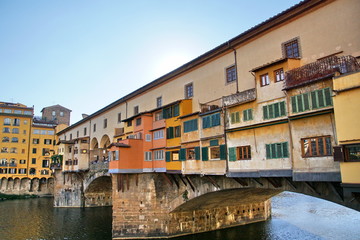 Fototapeta na wymiar Iconic Vecchio Bridge in Florence over river Arno called Ponte Vecchio - Tuscany, Italy