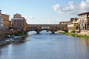 Obraz premium Iconic Vecchio Bridge in Florence over river Arno called Ponte Vecchio - Tuscany, Italy