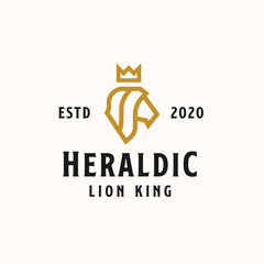 heraldic head lion with crown golden color logo template. Vector logo
