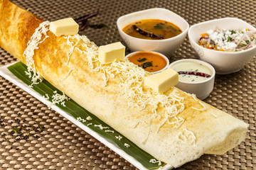 cheese Dosa / Indian breakfast crepes with cheese potato filling, selective focus