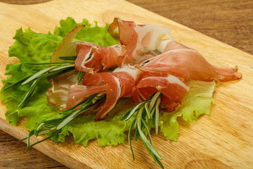 Sliced pork Jamon with rosemary