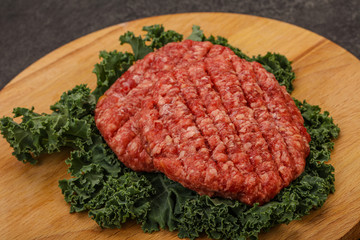 Raw beef burger cutlet for cooking