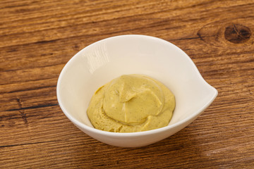 Dijon mustard sauce in the bowl