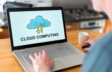 Fototapeta na wymiar Cloud computing concept on a laptop