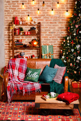 Interior room with brick walls and a window, Christmas tree, sofa and table with christmas-style things