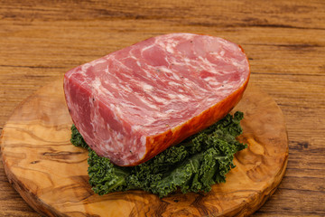 Beef ham piece over board