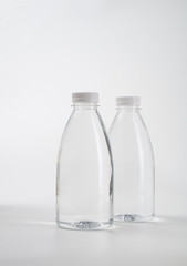 fresh liquid food product on blank plastic container bottle mockup