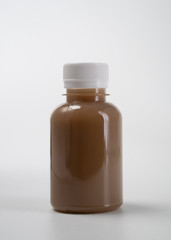 coffee product mockup on plastic bottle over white background