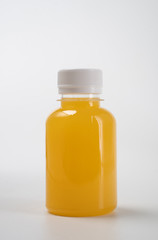 fresh liquid food product on blank plastic container bottle mockup. juice in a bottle or beverage product