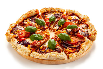 Pizza with ham, mozzarella, champignon and vegetables on white background
