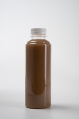 coffee product mockup on plastic bottle over white background