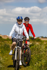 Healthy lifestyle - people riding bicycles
