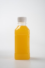 fresh liquid food product on blank plastic container bottle mockup. juice in a bottle or beverage product