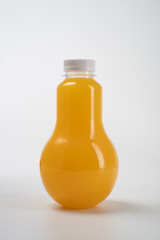 fresh liquid food product on blank plastic container bottle mockup. juice in a bottle or beverage product