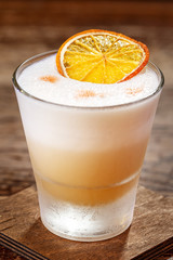 The cocktail is on the bar