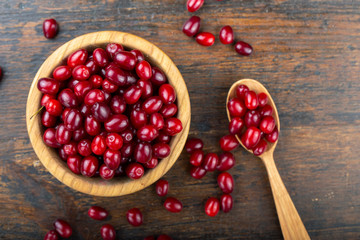 Dogwood on a wooden background. Gathering the summer harvest.