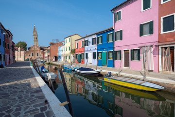 Fototapeta na wymiar Burano Venice. Situated on the Venetian lagoon 7 km from Venice, the island is famous for its colorful houses and numerous canals