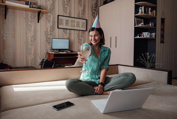 Girl celebrating birthday online in quarantine time.