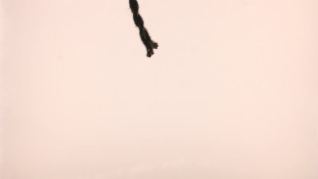 A piece of rope cut with scissors. As a symbol of something not good.