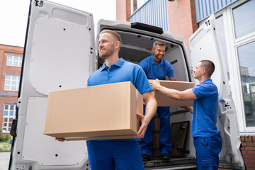 Truck Movers Loading Van Carrying Boxes