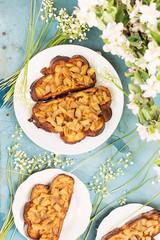 Sandwiches with apples and lilies of the valley