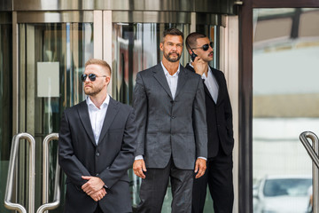 Security Guard Service Protecting Business Man