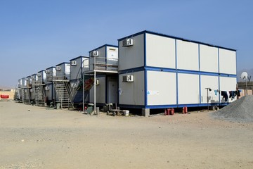 Portacabin, porta cabin, temporary labors camp , Mobile building in industrial site or office container Portable house and office cabins. Labor Camp. Porta cabin. small temporary houses