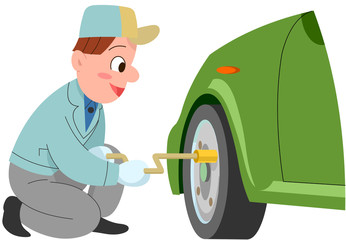 自動車のタイヤを点検する整備員 © S-room