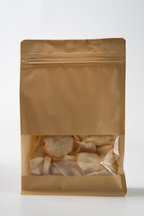 potato chips on blank standing pouch mockup with transparent window