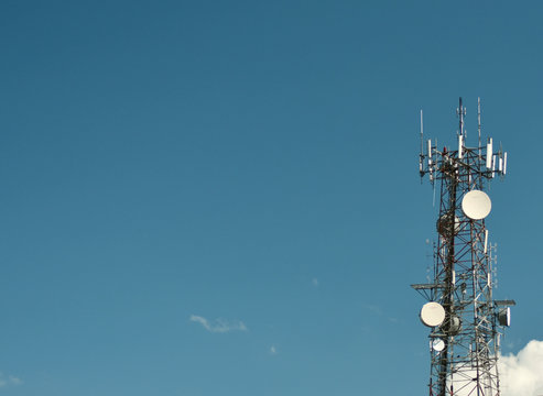 Telecommunication Tower In The Blue And Cloudy Sky In Quebec, Canada