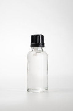 essential oil bottle. Mock up bottle cosmetic or medical vial, flask real photo