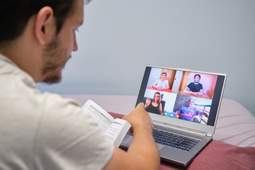 Man giving an online lecture to a group of people of different ages. Online teaching and diversity concept.