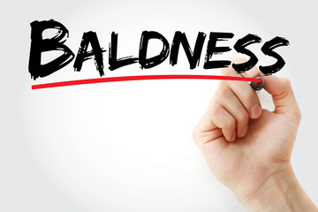 Baldness text with marker, medical concept background