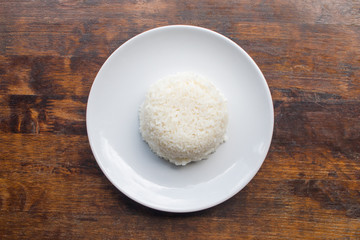 Streamed rice against the Wooden floor background