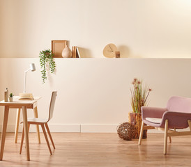 Modern and new style decorative wooden table and chair concept in the room, yellow background wall style with accessory book and lamp.