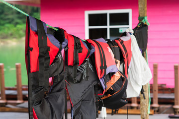 Drying life jackets on the clothes rail.