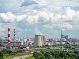 Aerial view of chimneys of a power plant, an industrial district in the North of Moscow