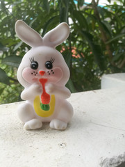 Toy Rabbit of small size in white color and have black eyes.