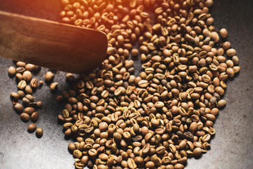 Coffee beans roasted traditional,coffee beans are being roasted in a pan.Roasting the peeled coffee...