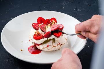 sweet dessert meringue with fresh strawberries